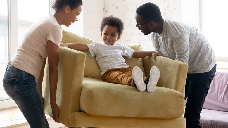 Family moving furniture