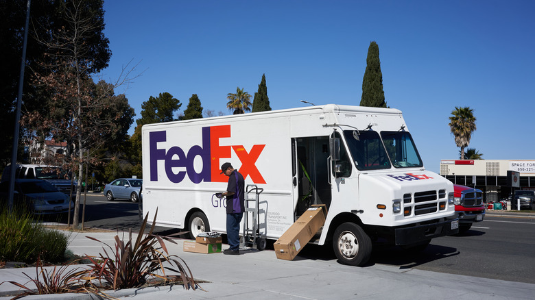 FedEx delivering packages