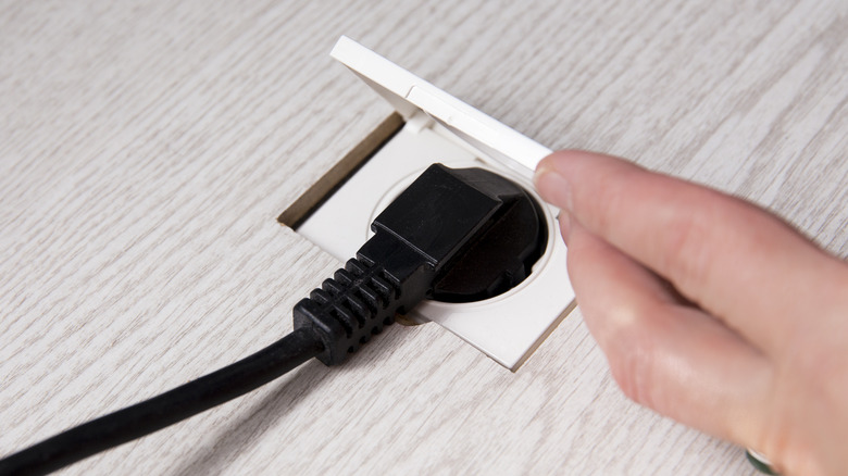 electrical outlet inside the floor