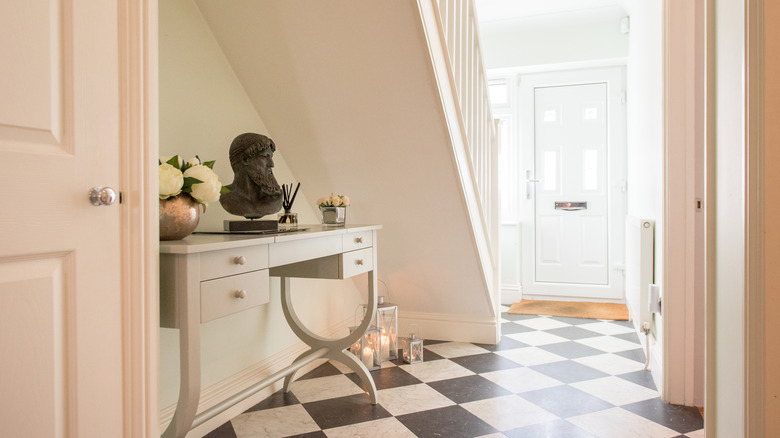 checkerboard hallway and entranceway