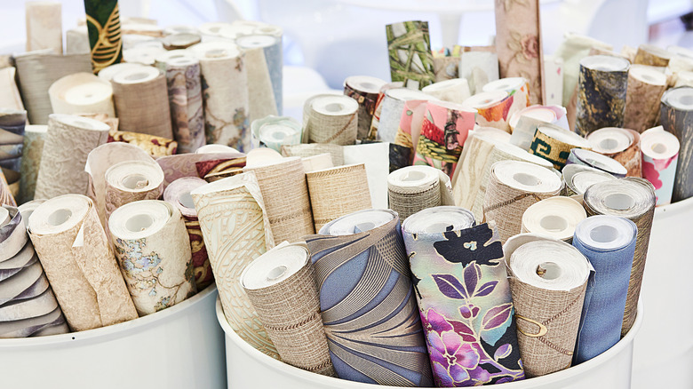 Rolls of wallpaper  in barrels