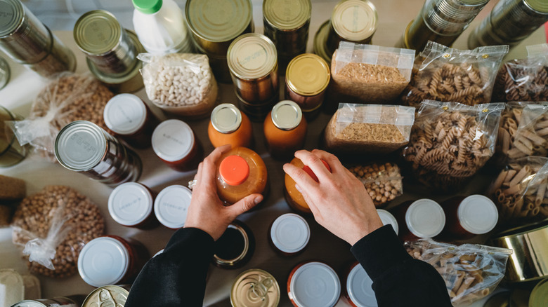 Person organizing pantry