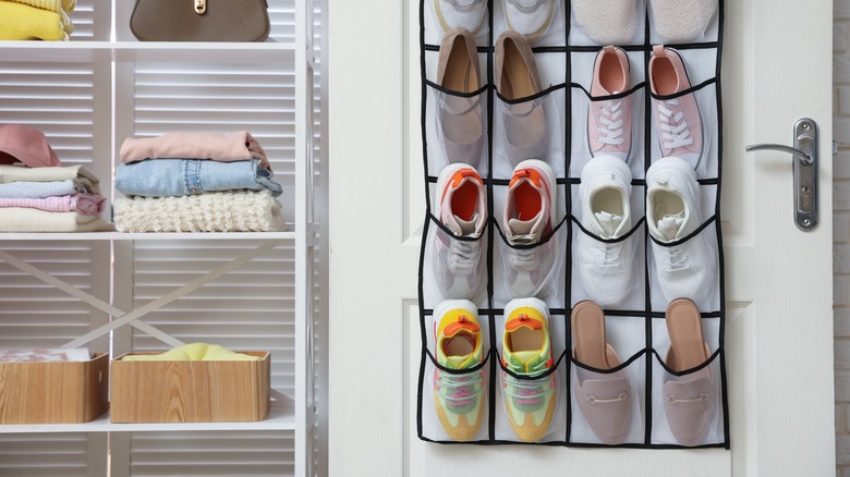 Hanging shoe organizer on the back of a door.