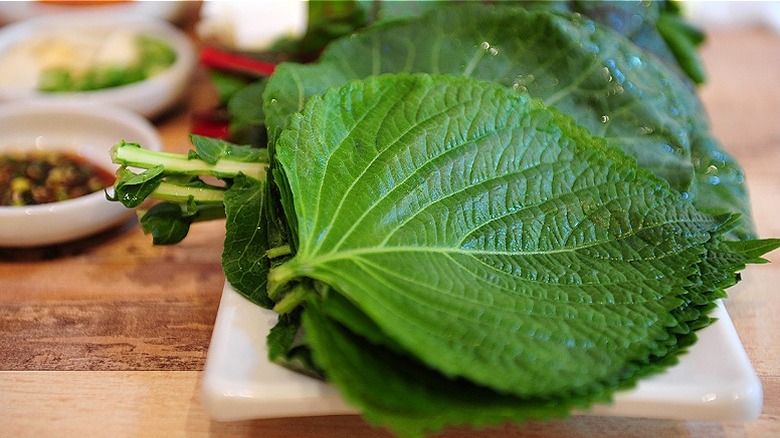 Close-up of stacked shiso leaves as part of a meal
