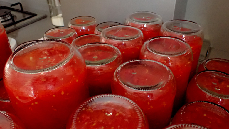 Canning tomatoes to make use of excess crop