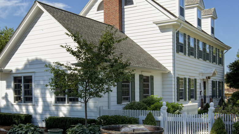 House with white siding and gray roof
