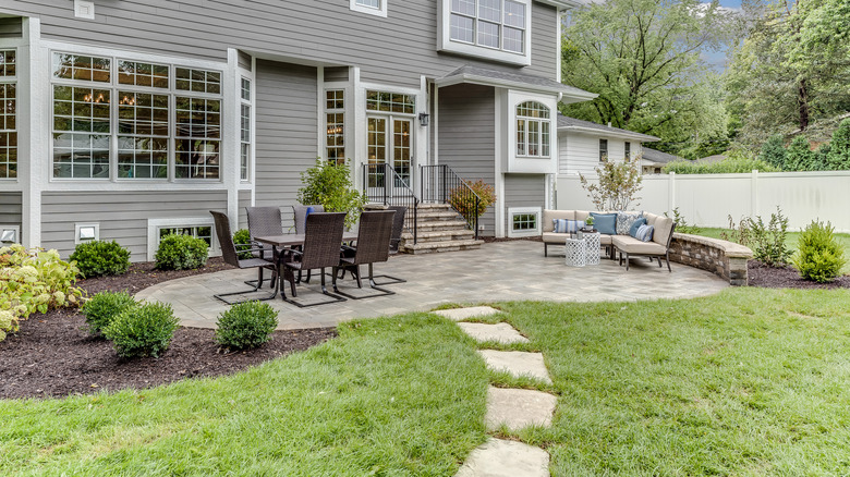 landscaped backyard patio and garden