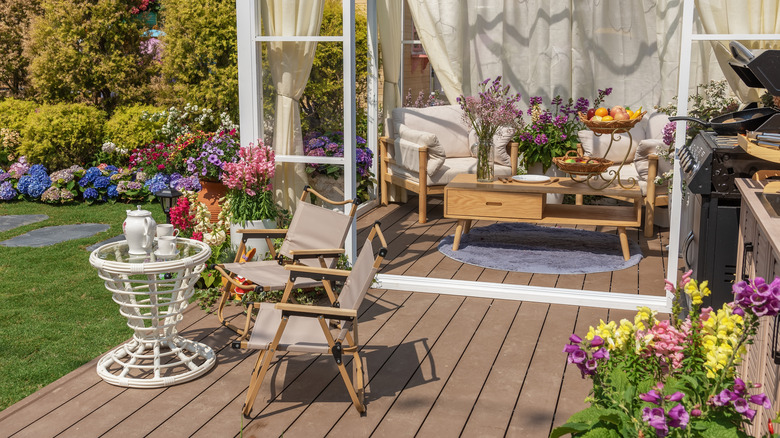patio space next to flower beds