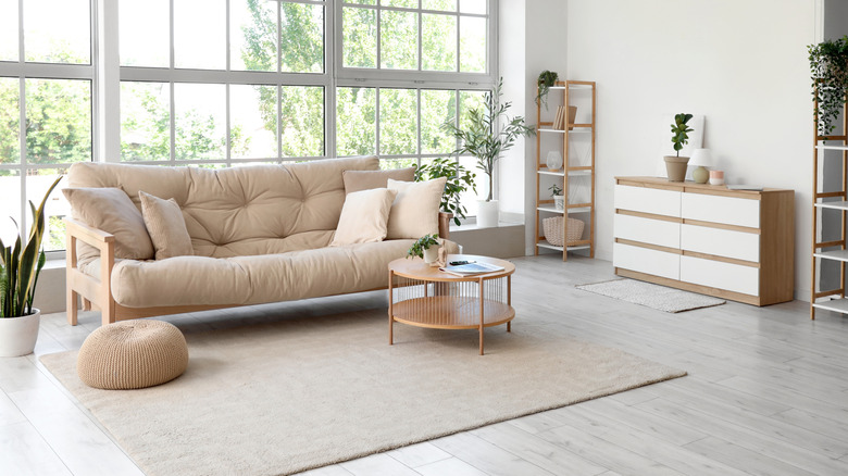 Living room with beige interior design