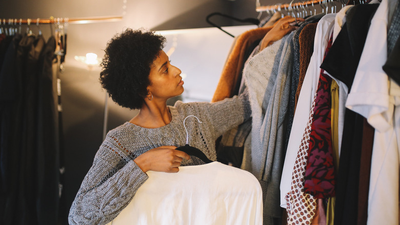 woman sorting closet 