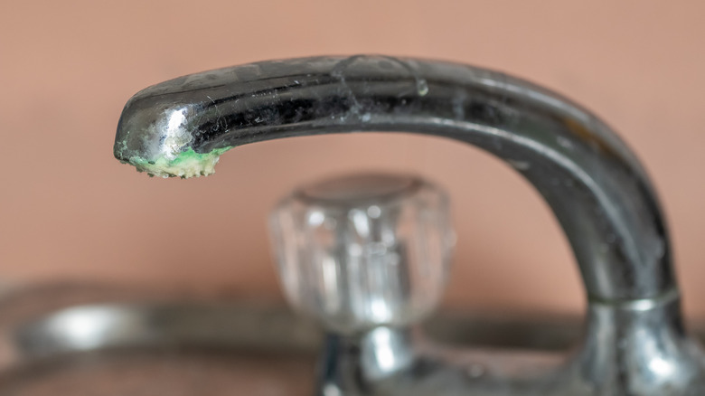 Dirty faucet with limescale