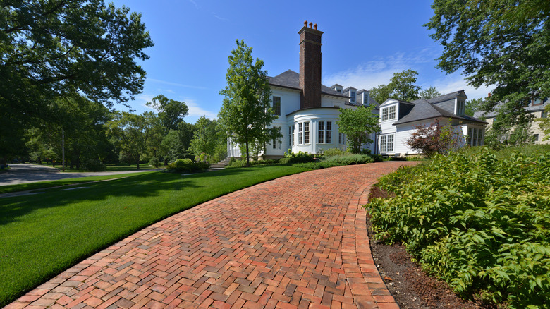 brick pathway going to house