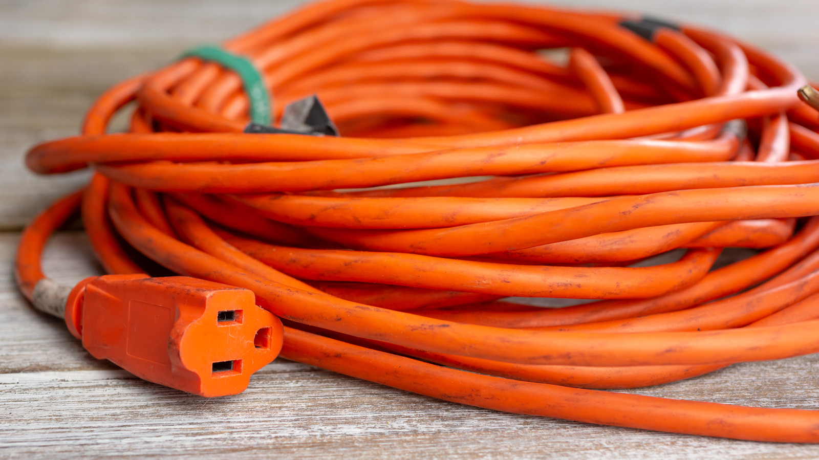The Genius Hack You Need To Store & Use Long Extension Cords Without