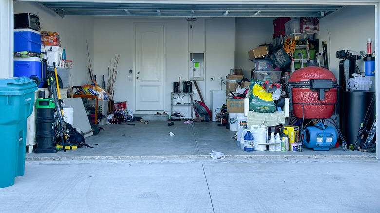 Open garage cluttered with items