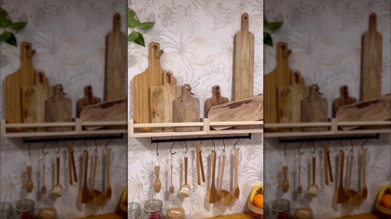 IKEA's BEKVÄM spice racks being used as kitchen wall storage.