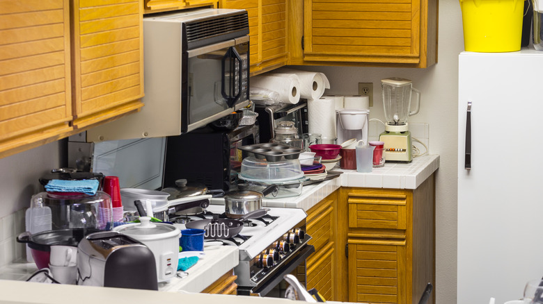 Countertop cluttered with appliances