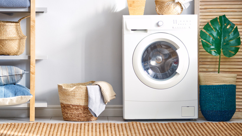 Rug in neutral laundry room