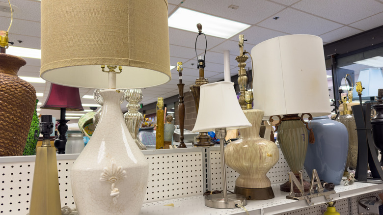 thrift store lamps on shelf