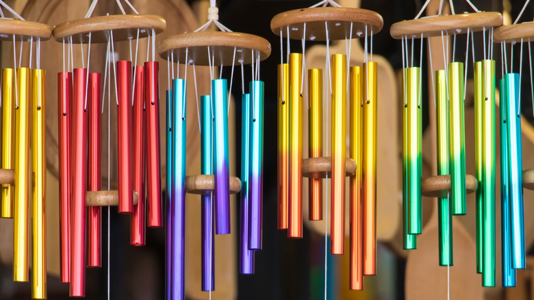 rainbow wind chimes in row