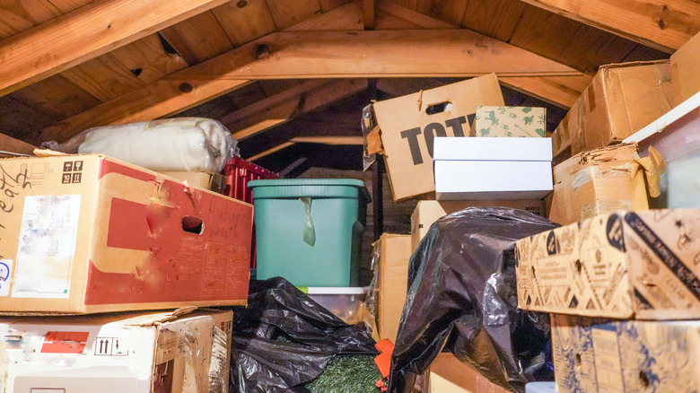 An attic filled with boxes, bins, and keepsakes.