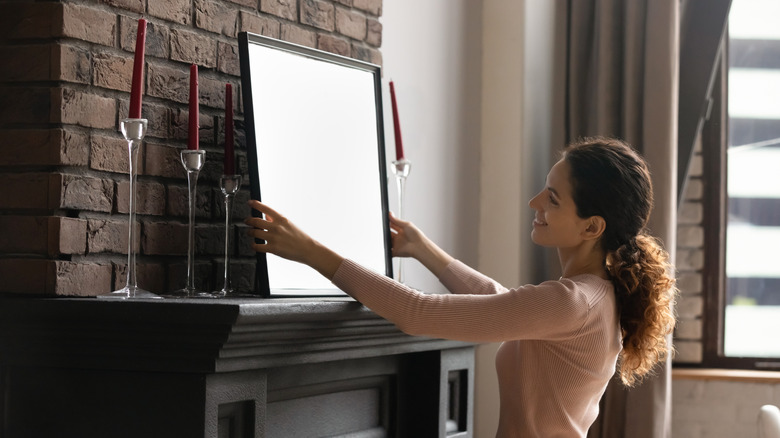 woman with a painted mirror