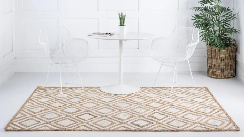 Geometric pattern rug and chairs