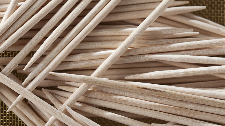 closeup pile of toothpicks