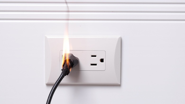 Electrical fire starting at outlet 