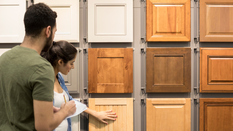 Couple purchasing wood