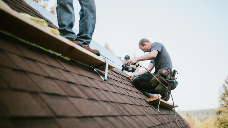 Man installing a new roof