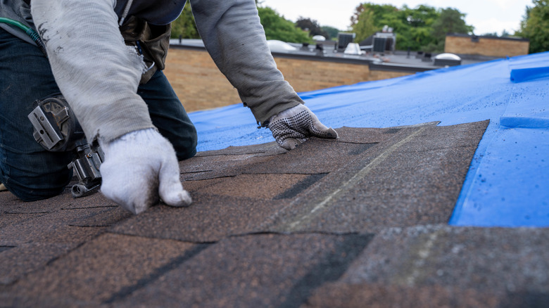 Man installing new roof