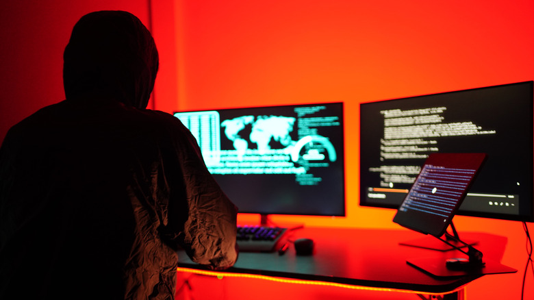 hacker working with computer setup