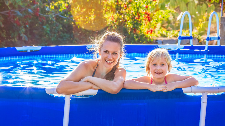 mother and child in pool