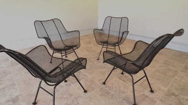 A set of vintage Woodard Sculptura chairs