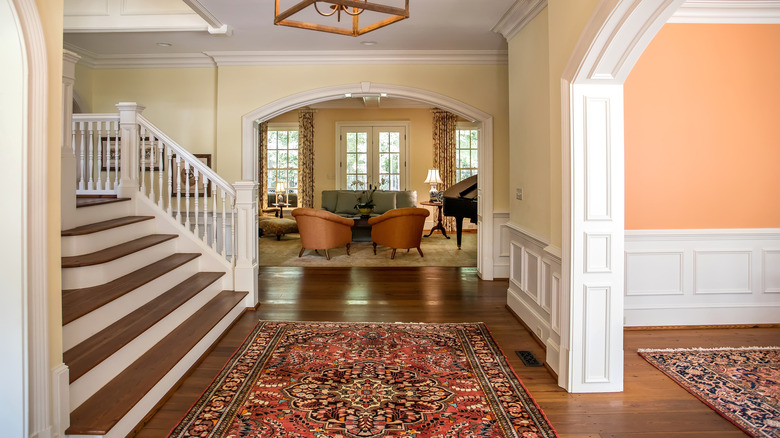 A wool rug displayed prominently in a modern home