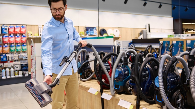 Customer shopping for vacuums