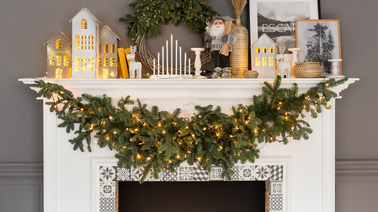 garland hanging from fireplace mantel 