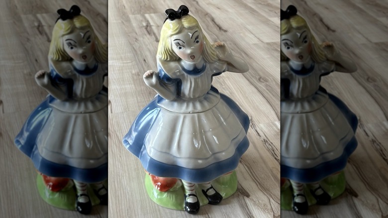 The Regal China Alice in Wonderland cookie jar, as seen in an eBay listing.