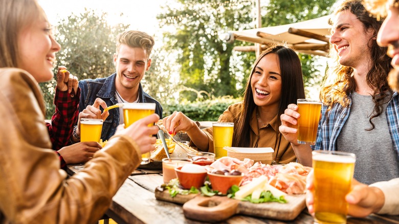 Friends eating a meal outside