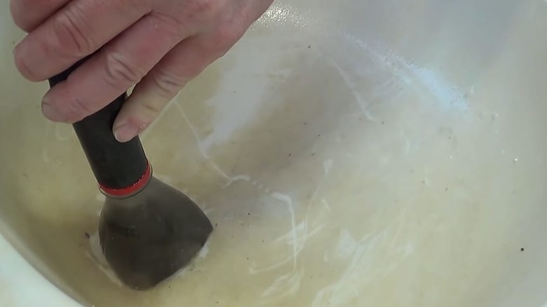 hose attached to bottle top