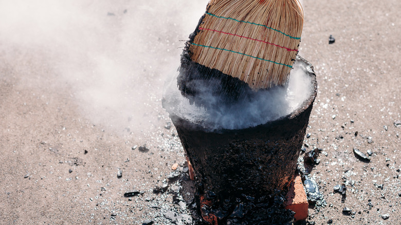 hot tar in a bucket