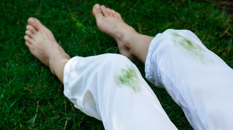 Grass stains on white trousers