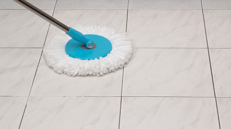 mopping tile floor