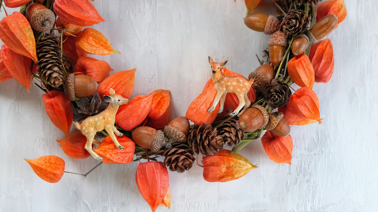Fall wreath with acorns and other decorative elements