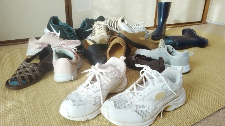 Untidy pile of shoes