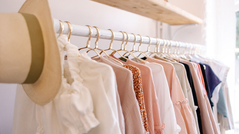 Clothes hanging in closet