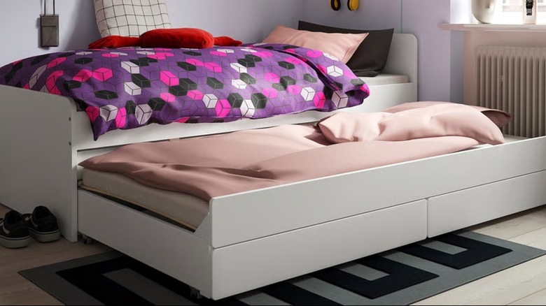 IKEA twin bed with trundle pulled out.