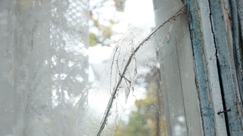 Window crack covered with tape