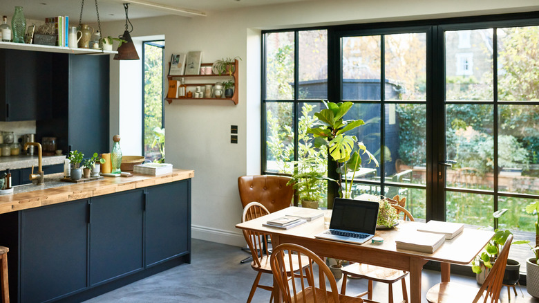 Kitchen with paneled french doors.