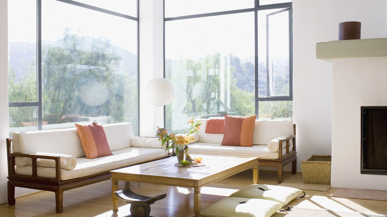large windows in a living room corner